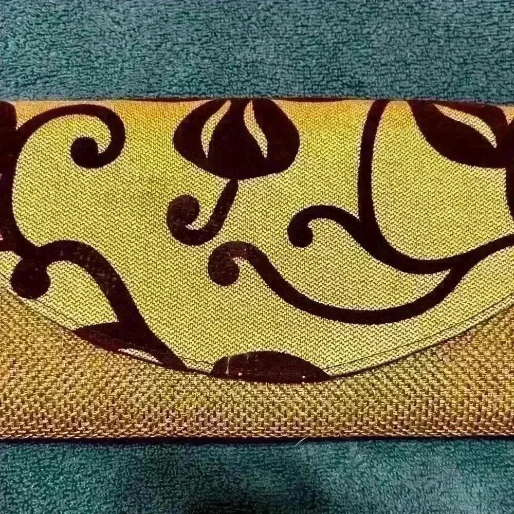 Hand woven larger clutch beige in  color classic style